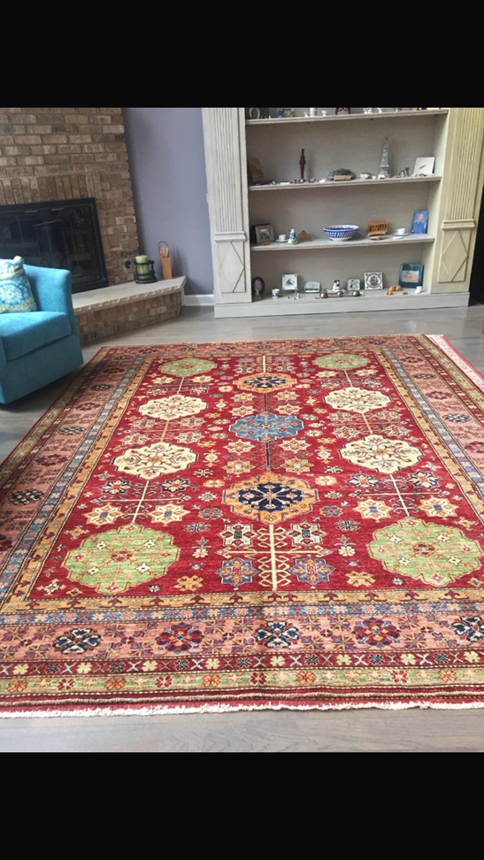 A red rug in a room

AI-generated content may be incorrect.